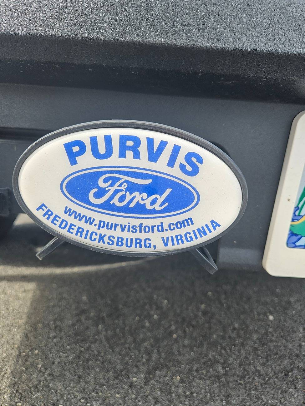 Ford Maverick Any tricks to getting the dealer logo off the paint? 1000003780