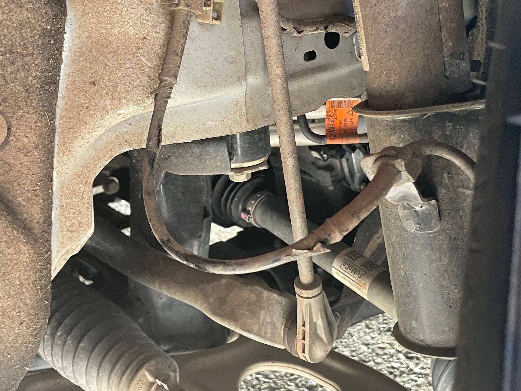 Ford Maverick Cable Rubbing in Wheel Well Causing Clicking Sound While Driving. Anyone Else? IMG_4556