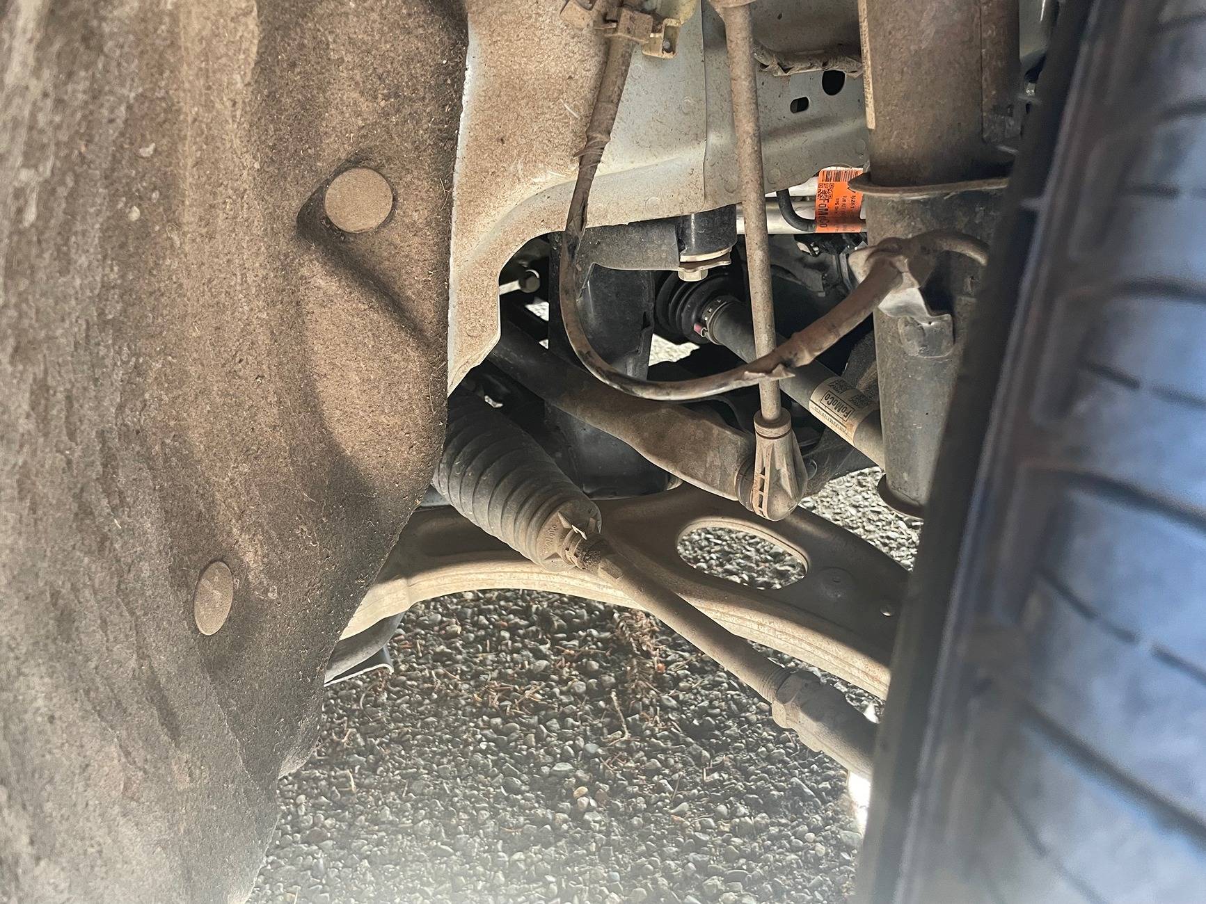Ford Maverick Cable Rubbing in Wheel Well Causing Clicking Sound While Driving. Anyone Else? IMG_4555