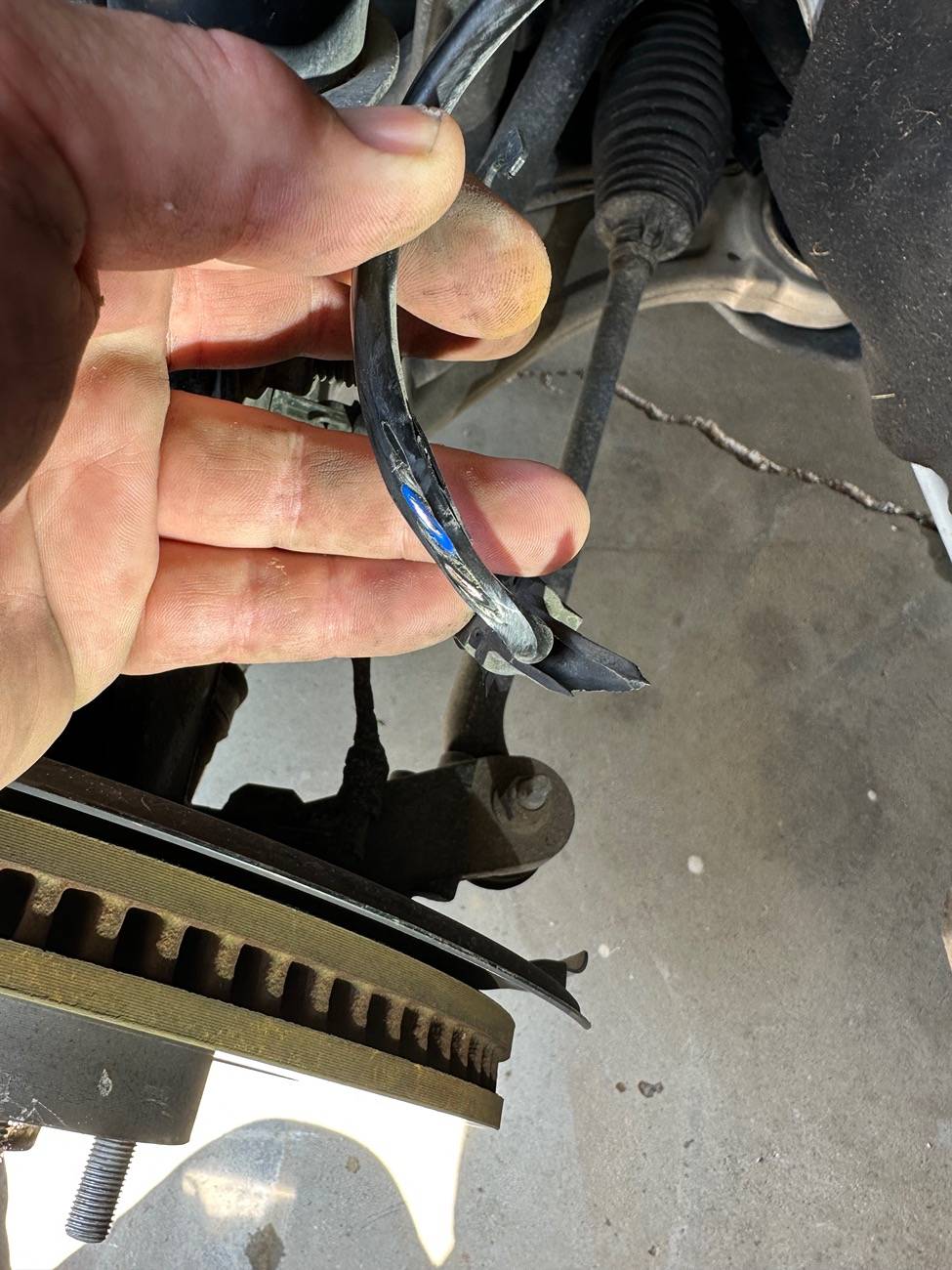 Ford Maverick Cable Rubbing in Wheel Well Causing Clicking Sound While Driving. Anyone Else? IMG_7714