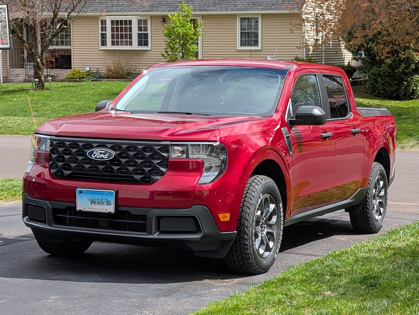 Ford Maverick Hybrid MPG with bigger all terrain tires PXL_20250427_185050315~3