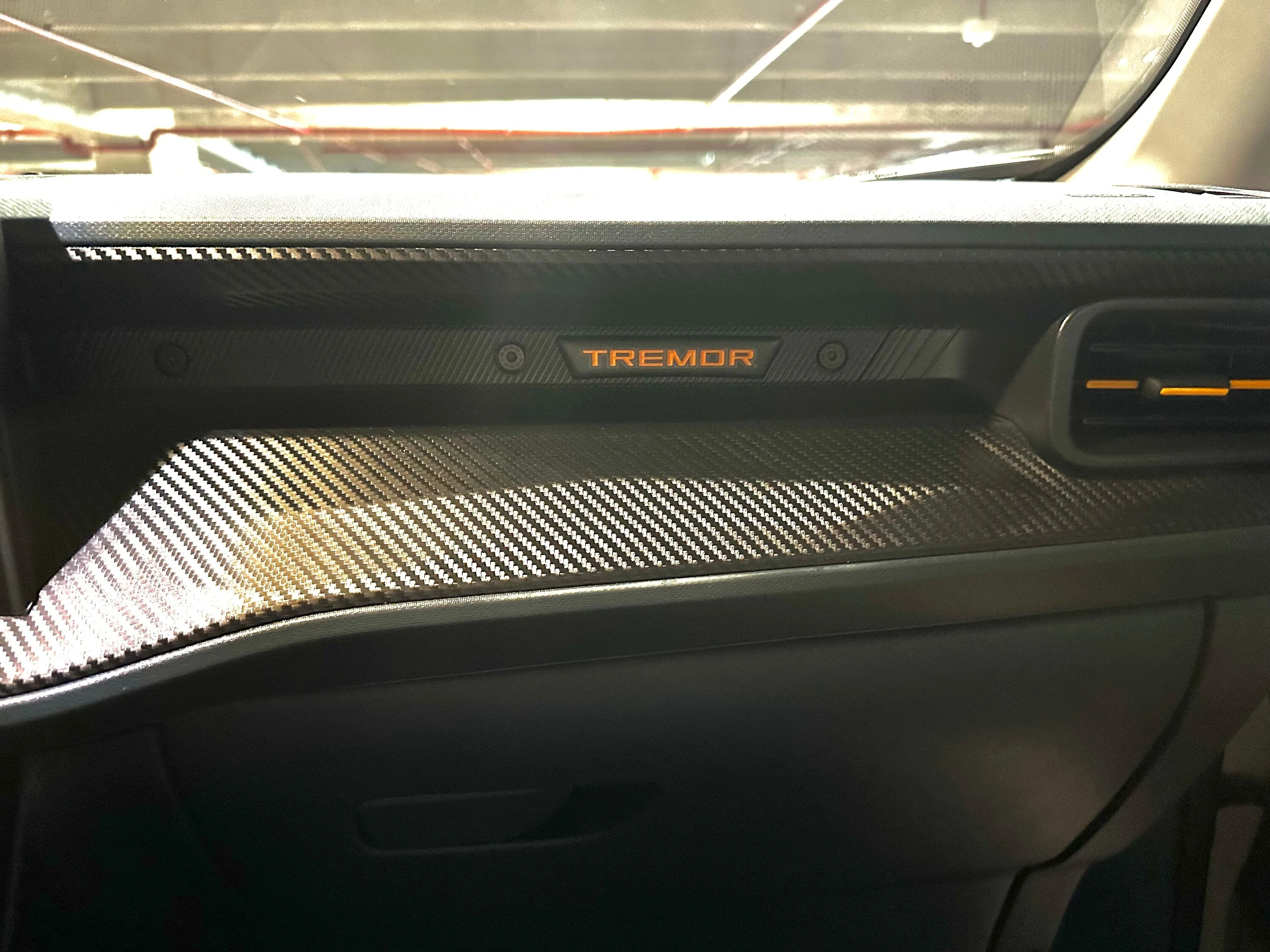 Ford Maverick Tufskinz Tremor Emblem on Passenger Dash Tufskinz Tremor