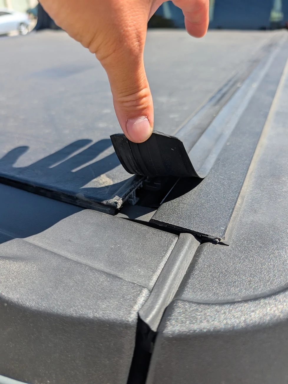 Ford Maverick Ford REV roll-up tonneau cover is peeling back PXL_20250816_213907806