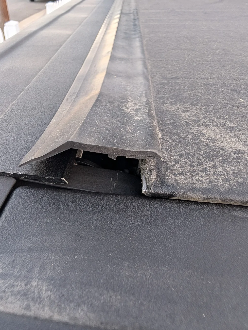 Ford Maverick Ford REV roll-up tonneau cover is peeling back PXL_20250817_022051286