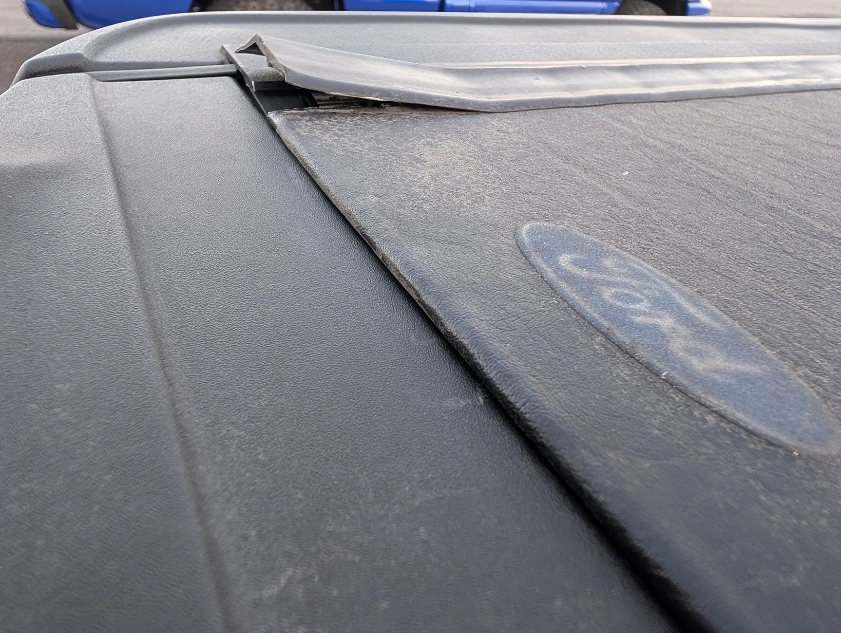 Ford Maverick Ford REV roll-up tonneau cover is peeling back PXL_20250817_022054568