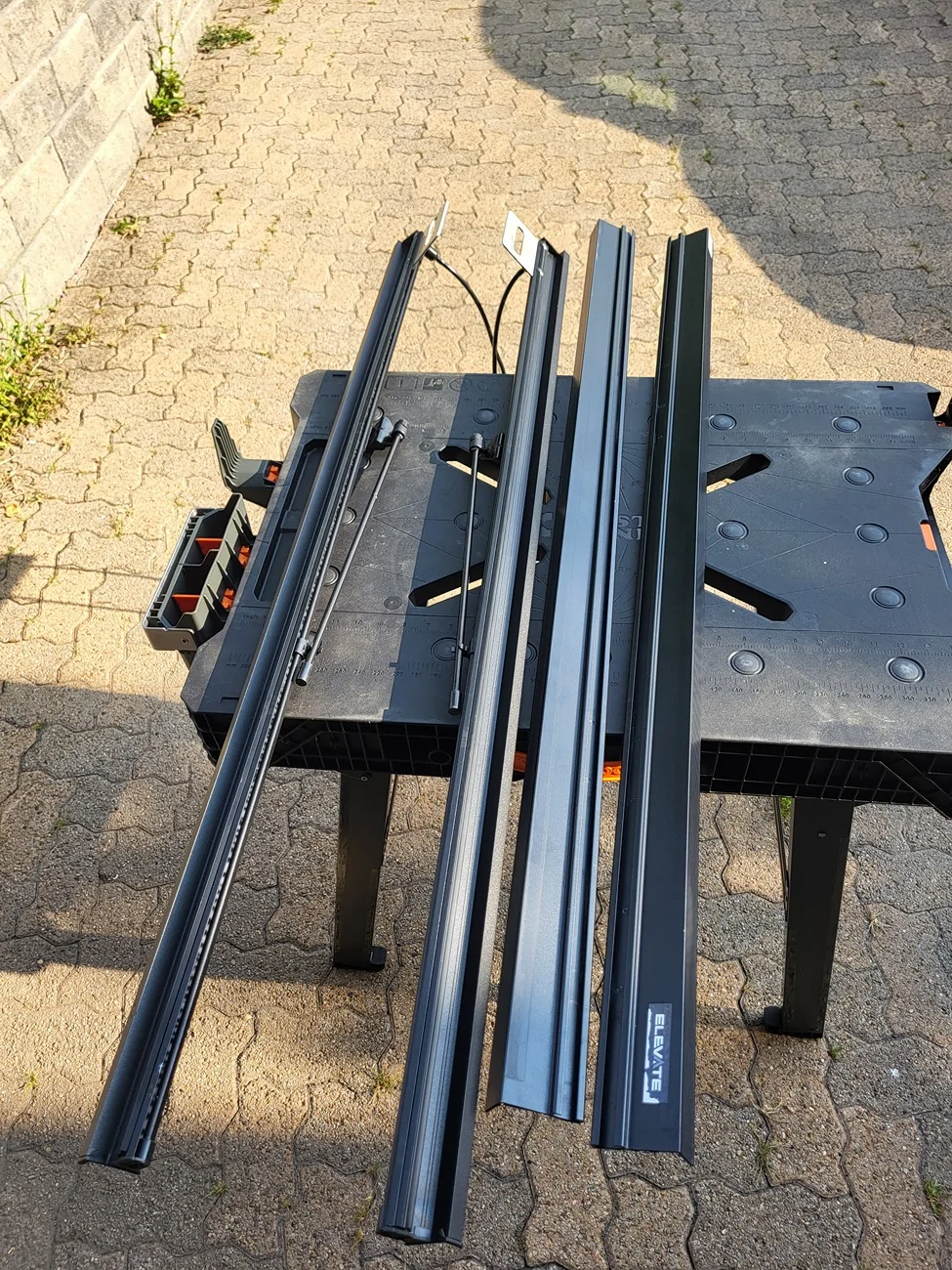 Ford Maverick Various items: Folding bed cover, elevate t-slot rails, Rhino rack bars 20250805_180015