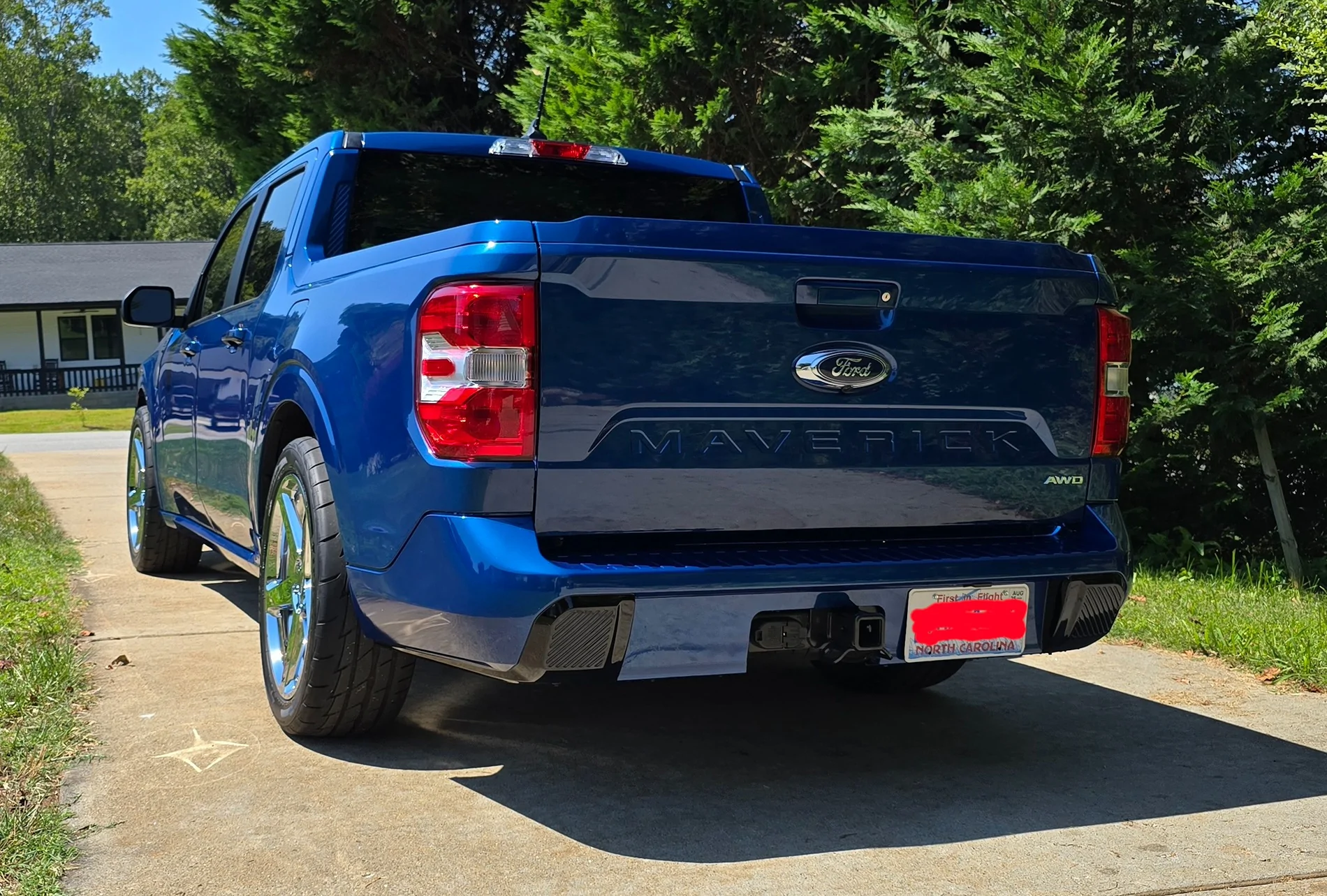 Ford Maverick New member.  2024 Maverick Atlas Blue.  Lowered on 20's 20250830_134618