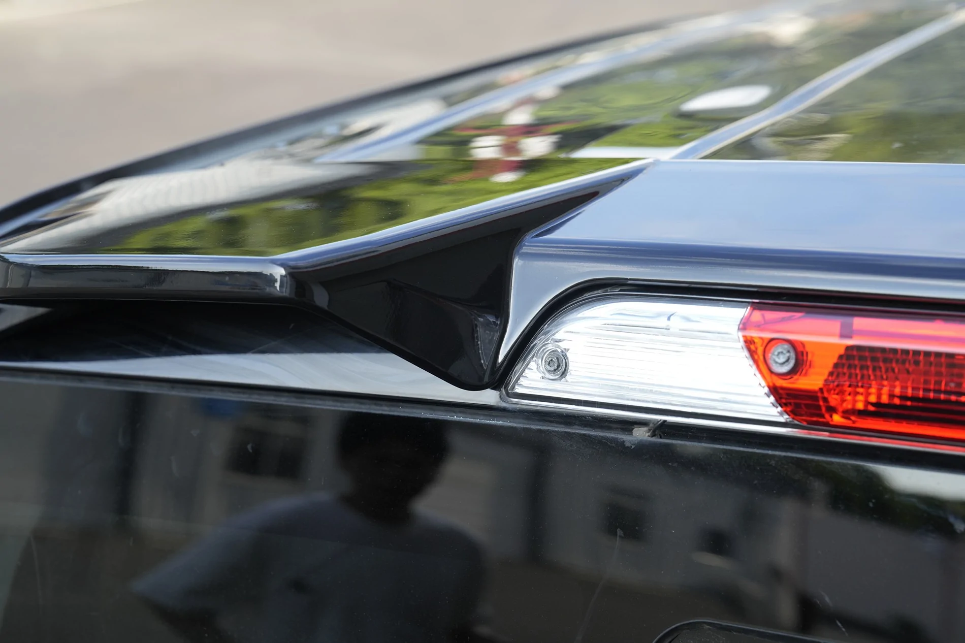 Upgrade your ride with our sleek Rear Roof Spoiler with code