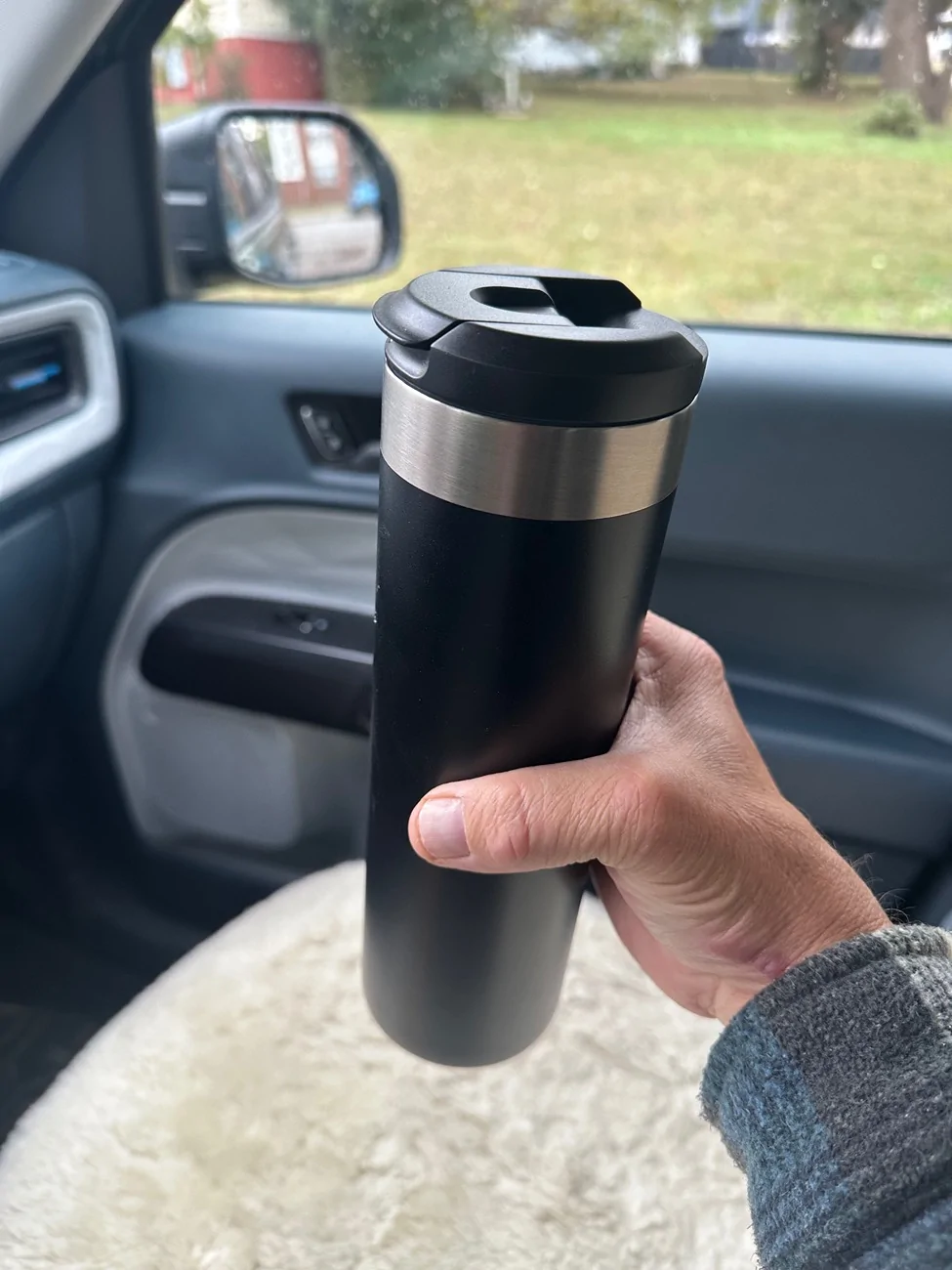 Aldi water bottle fits perfectly in front doors. | MaverickTruckClub -  2022+ Ford Maverick Pickup Forum, News, Owners, Discussions