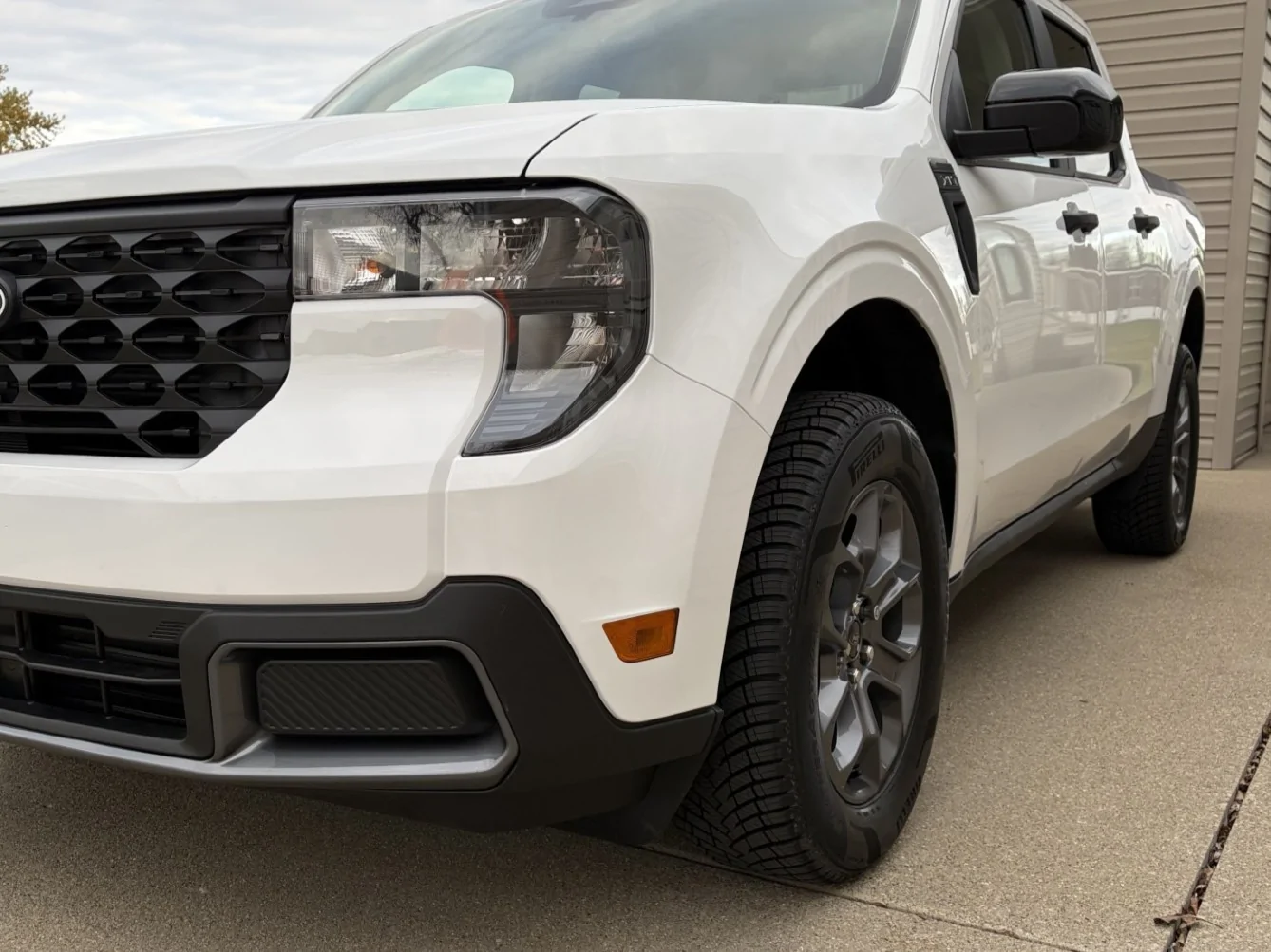 Ford Maverick Pirelli Scorpion WeatherActive tires installed. whitemav4cro