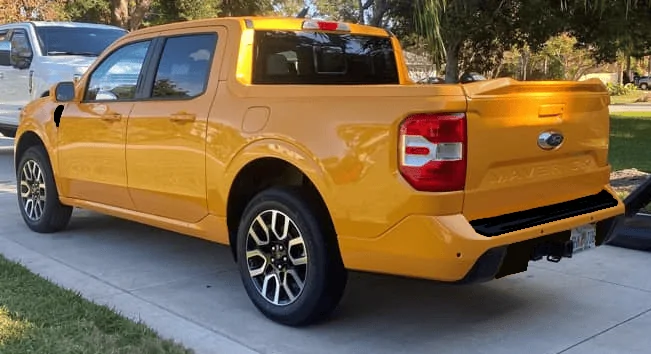 Ford Maverick Painted grill bar, bumpers, fender vents, hood scoop - matched to body color on Maverick (Cyber Orange) 