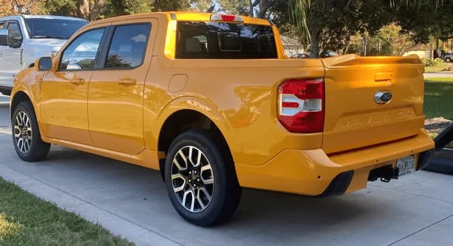 Ford Maverick Painted grill bar, bumpers, fender vents, hood scoop - matched to body color on Maverick (Cyber Orange) p1