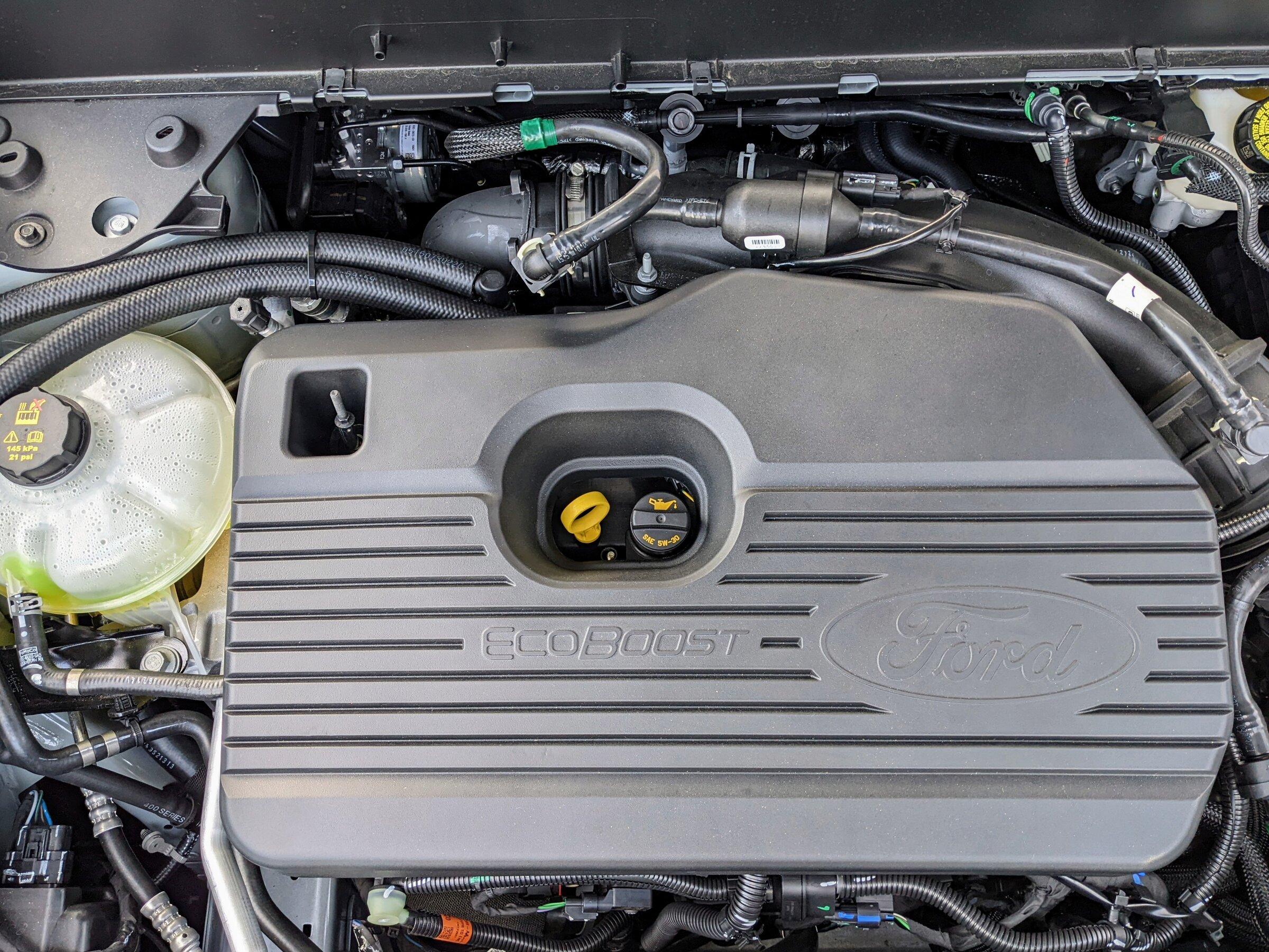 Ford Maverick 2.0l engine appearance cover installed - part numbers PXL_20211217_211710773~2