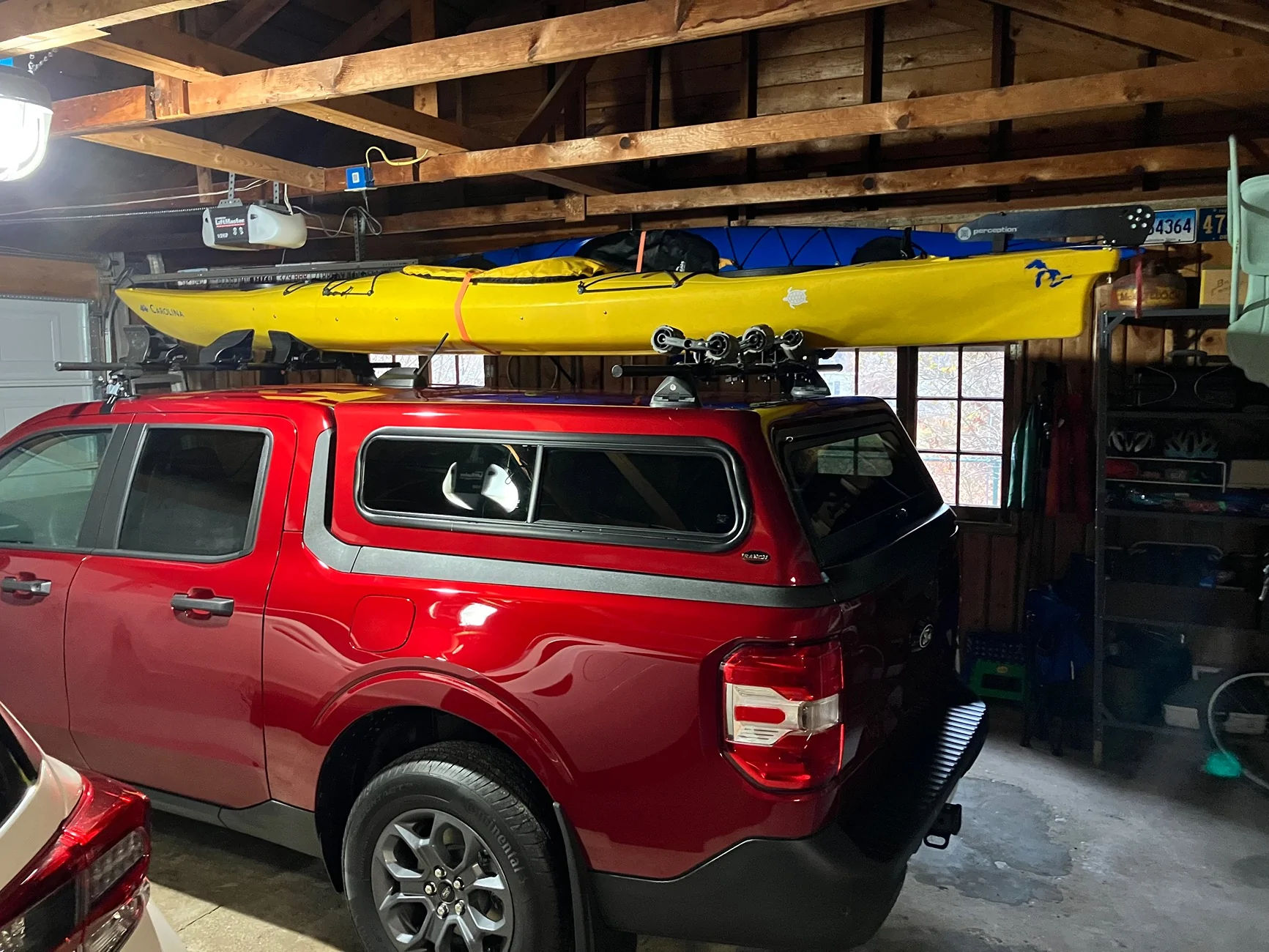 Ford Maverick Sierra Xtra Topper + Yakima installed for carrying kayaks IMG_4867