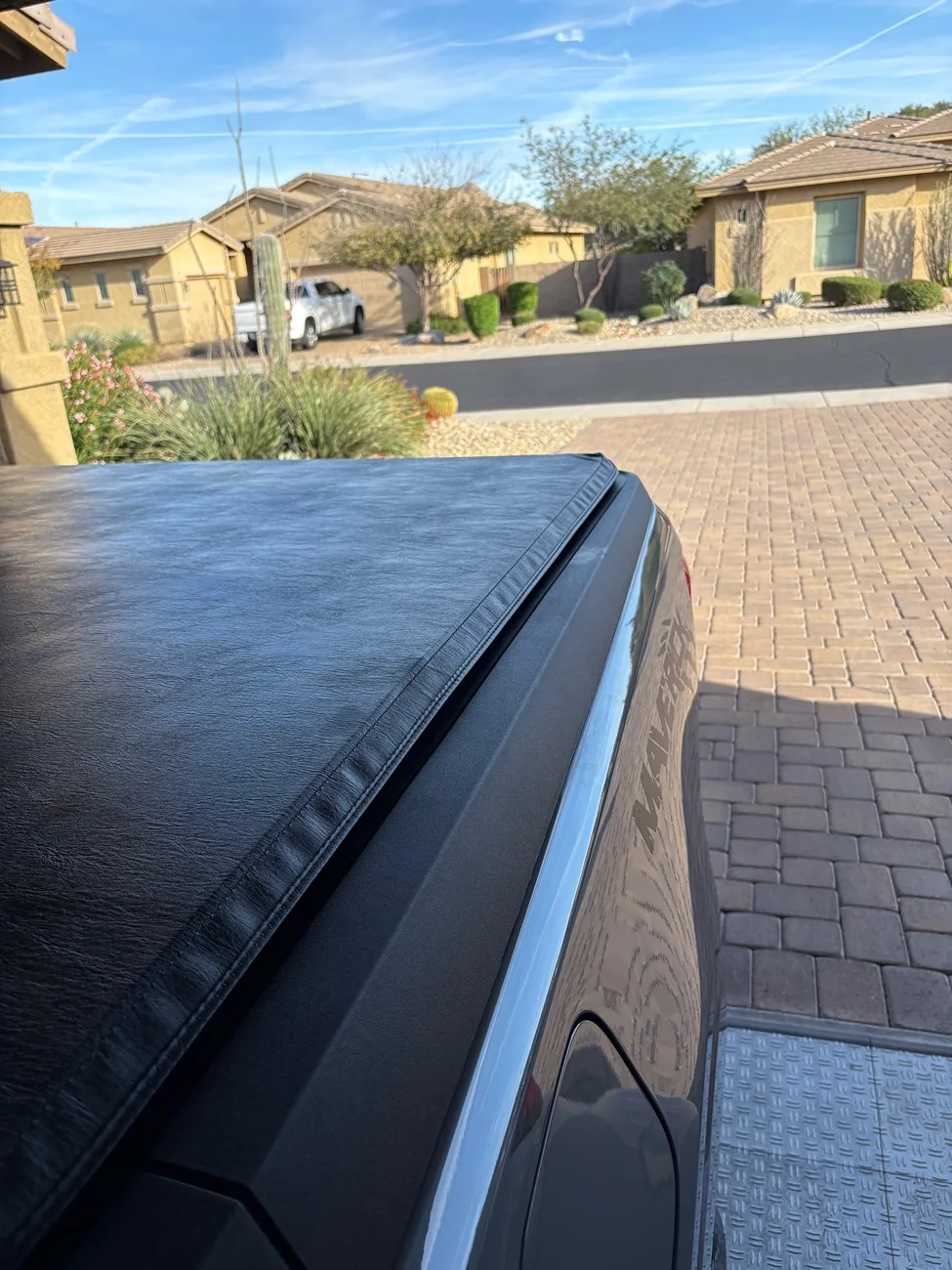 Ford Maverick Light scratches from garage door scuffing rear bumper IMG_1147