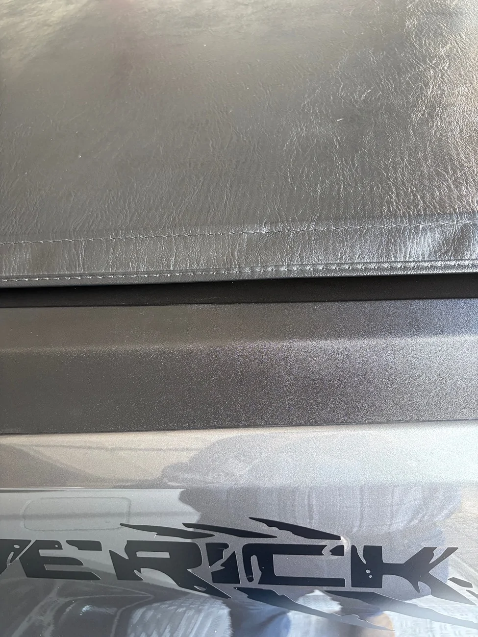 Ford Maverick Light scratches from garage door scuffing rear bumper IMG_1145