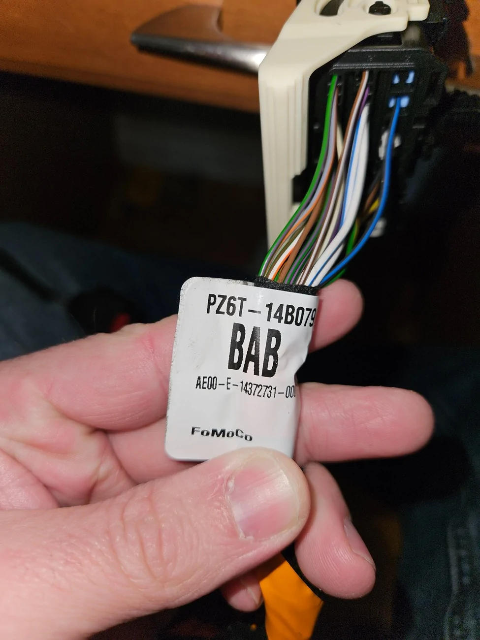 Ford Maverick Part number for the factory outlet and light that goes in bed? Harness tag