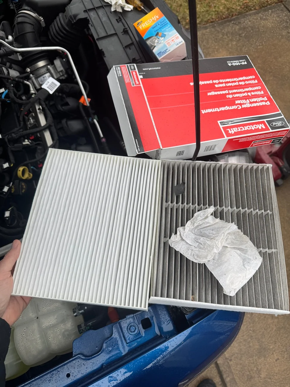 Ford Maverick Cabin air filter replacement, paper found on top of filter. IMG_3341