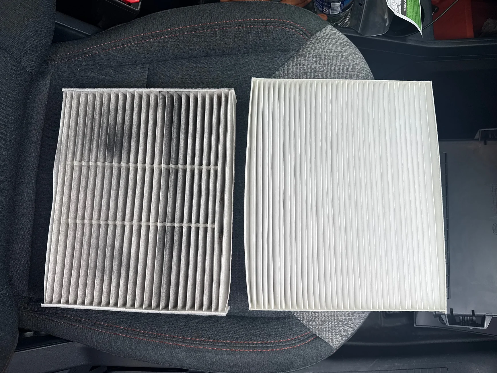 Ford Maverick Cabin air filter replacement, paper found on top of filter. IMG_3247