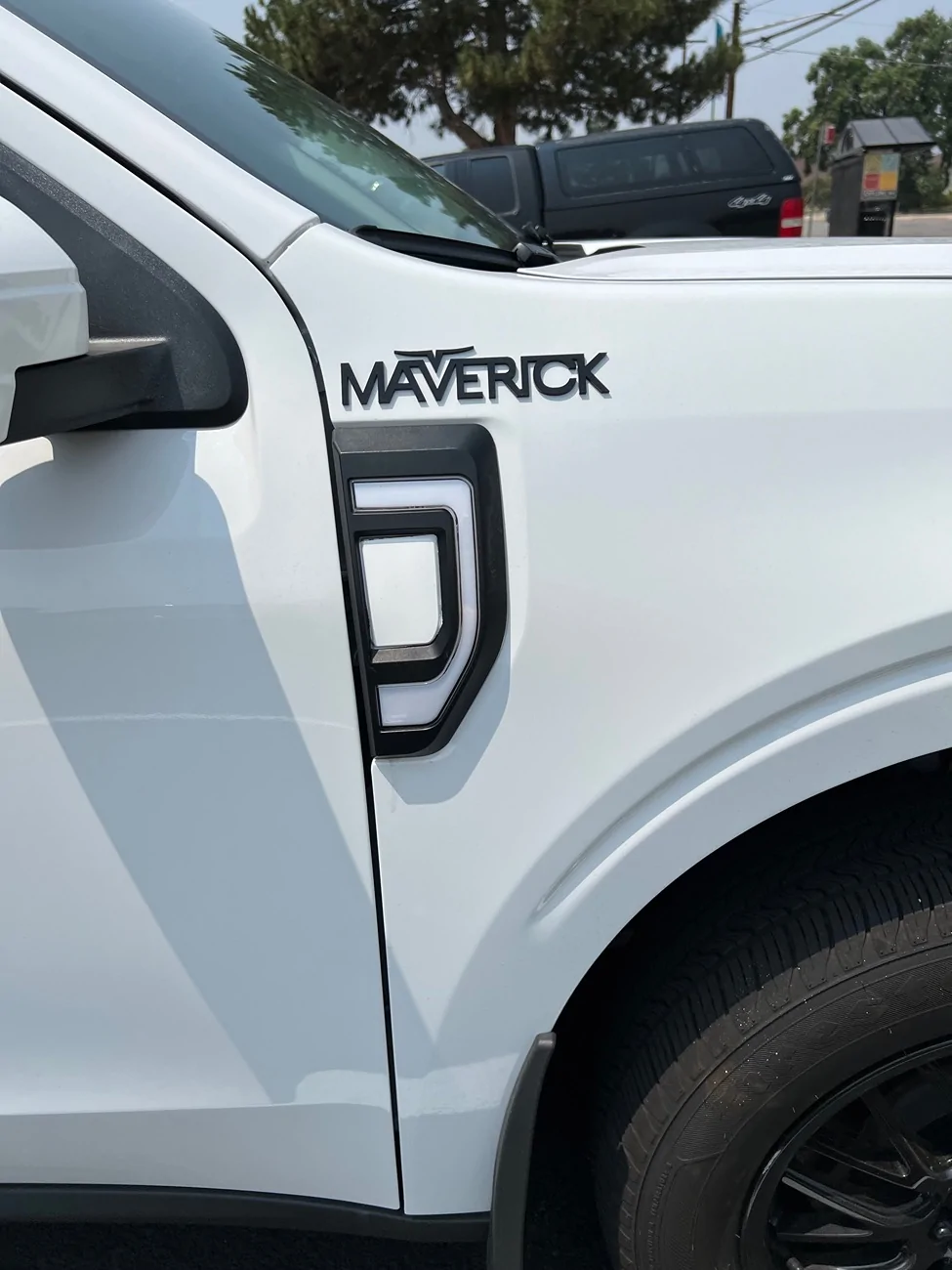 Ford Maverick Lariat Badge Available? IMG_1005