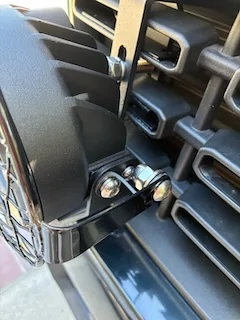 Ford Maverick Retro-look driving lights installed on grille IMG_6437