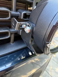 Ford Maverick Retro-look driving lights installed on grille IMG_6436