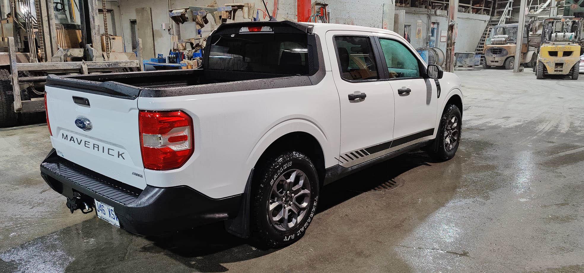 Ford Maverick White Maverick looking good with cab spoiler, mudflaps, tailgate spoiler, hood protector, stripes, tires 267742611_133272489136494_3045054164283562593_n