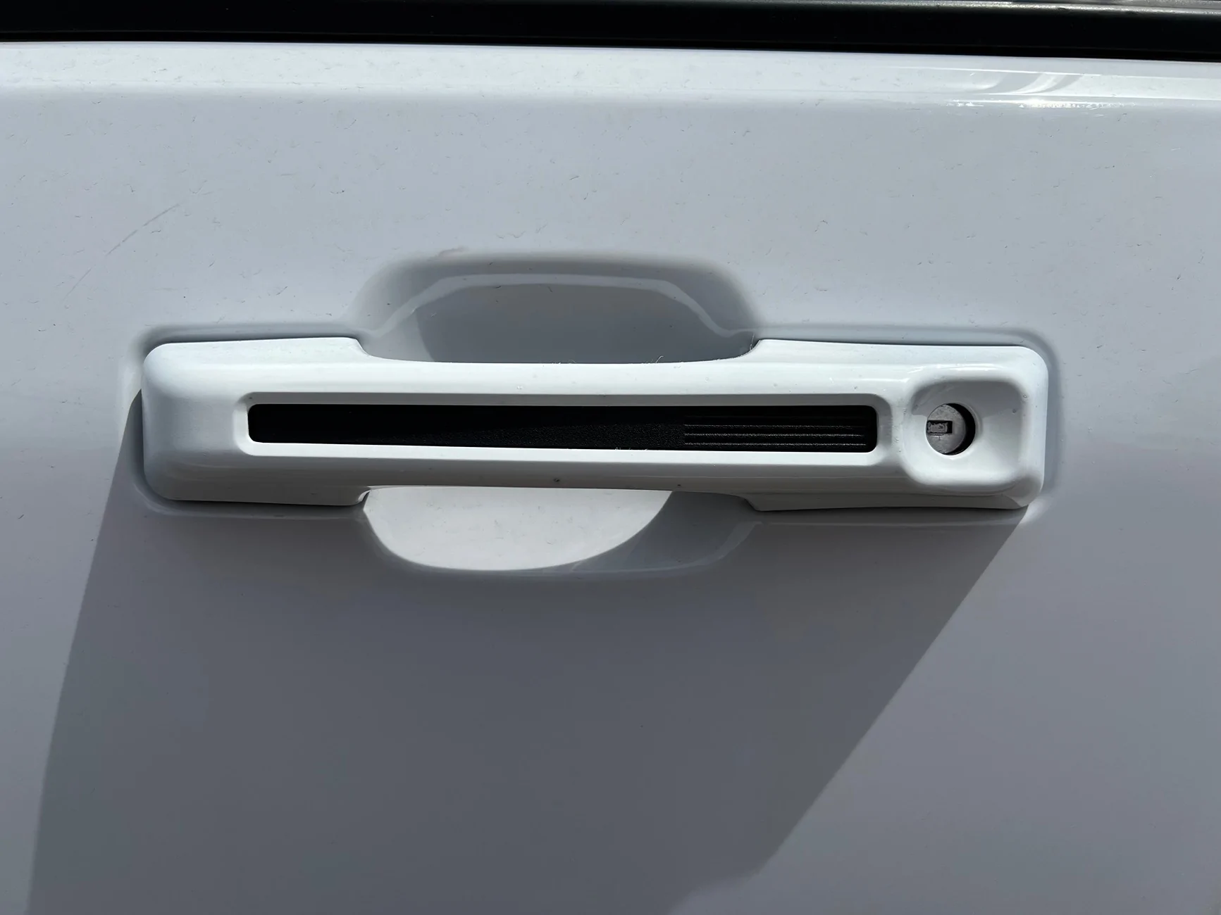 Ford Maverick How to remove blue piece / part on door handle?? IMG_0872