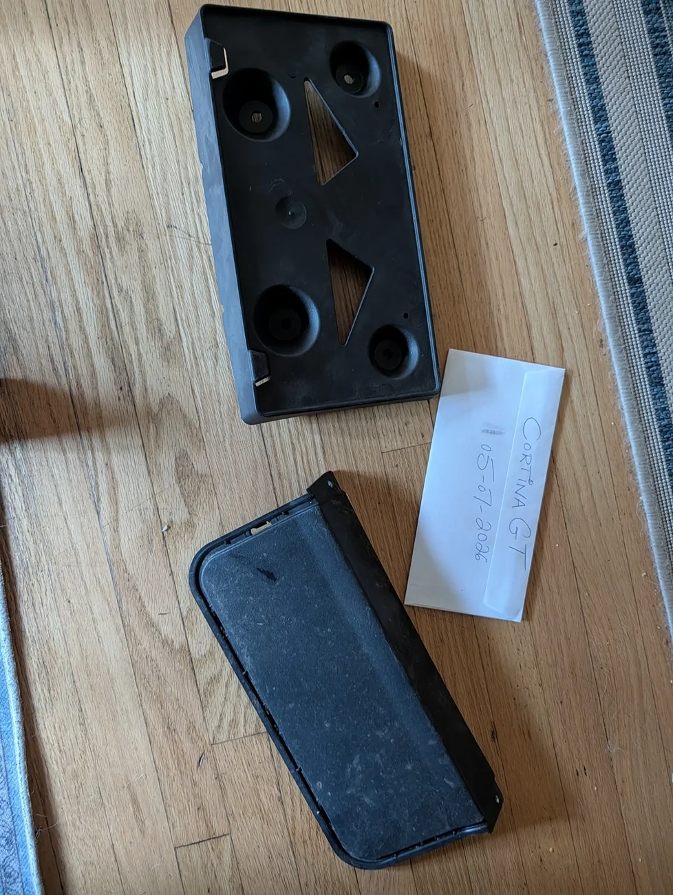 Ford Maverick Front license plate bracket, rear cover, dented tailgate shell PXL_20260508_014302610