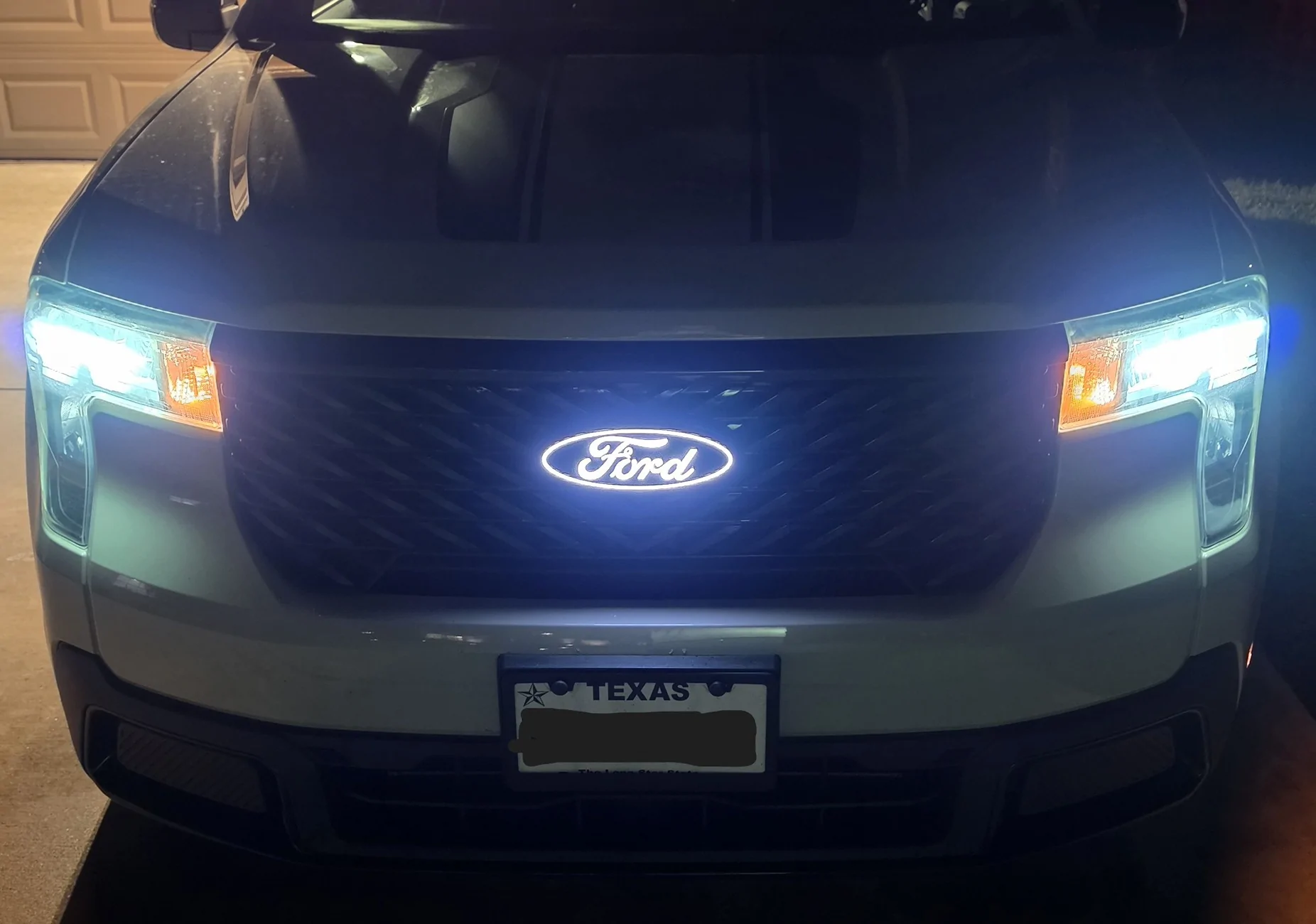 Ford Maverick Illuminated Ford Front Grille Emblem on my '25 XLT 20260619_212537