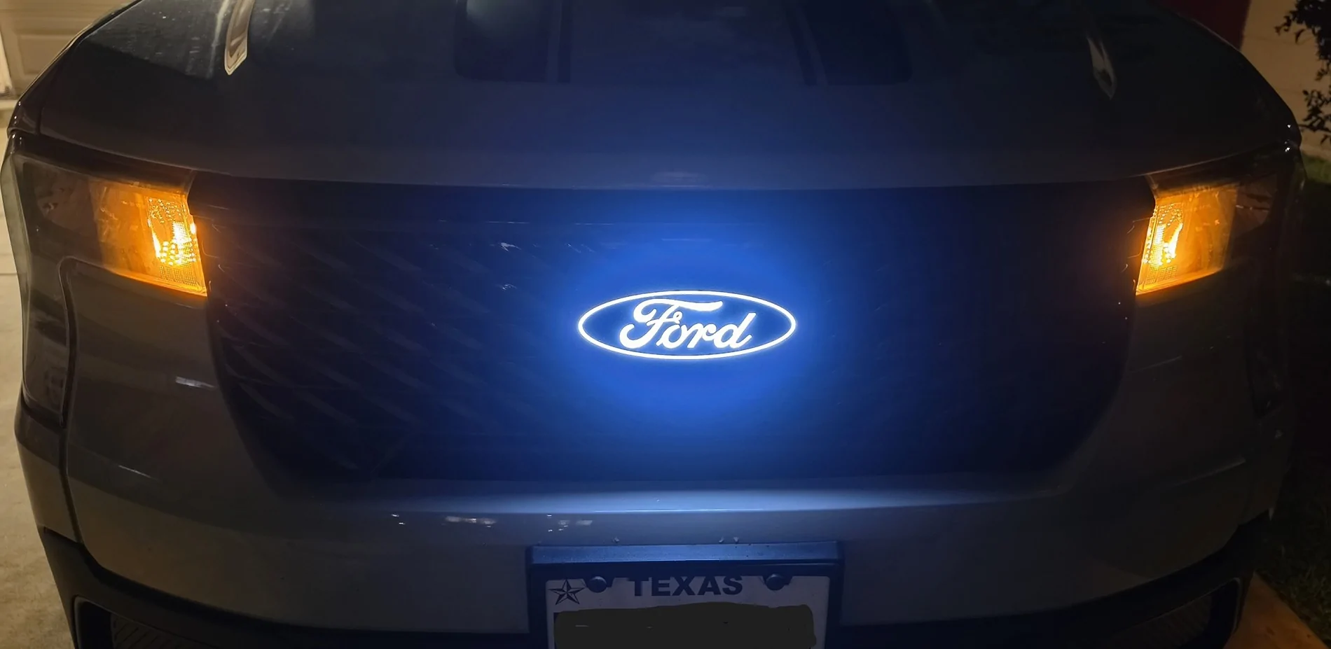 Ford Maverick Illuminated Ford Front Grille Emblem on my '25 XLT 20260619_212507