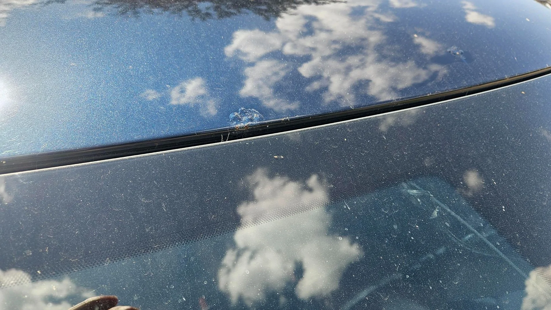 Ford Maverick Rust on roof bordering windshield Mav