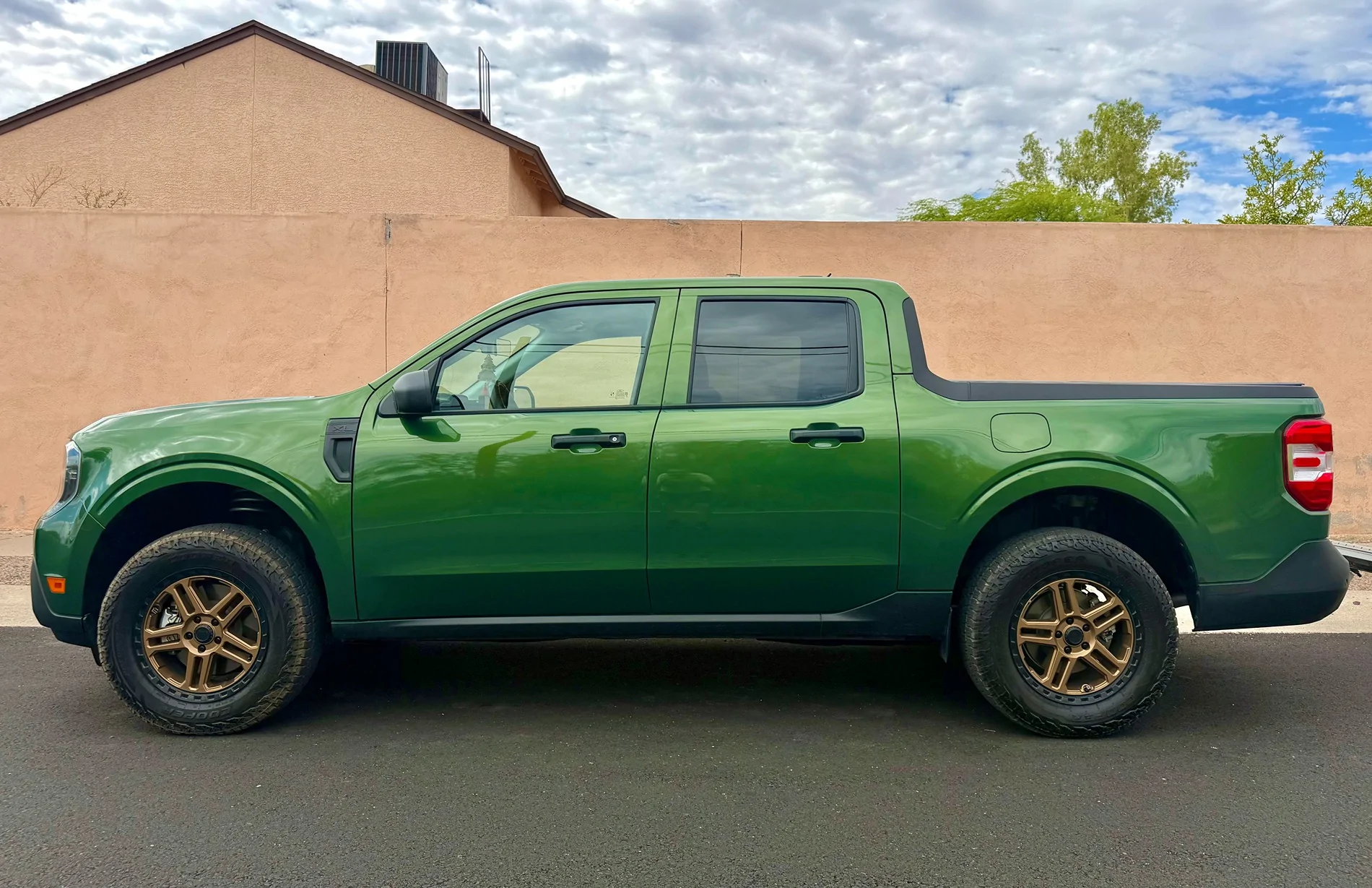 Ford Maverick 2025 Hybrid AWD on Cooper Discoverer Road+Trail AT 245/65/17 tires with 2" inch Eibach springs lift kit IMG_0297