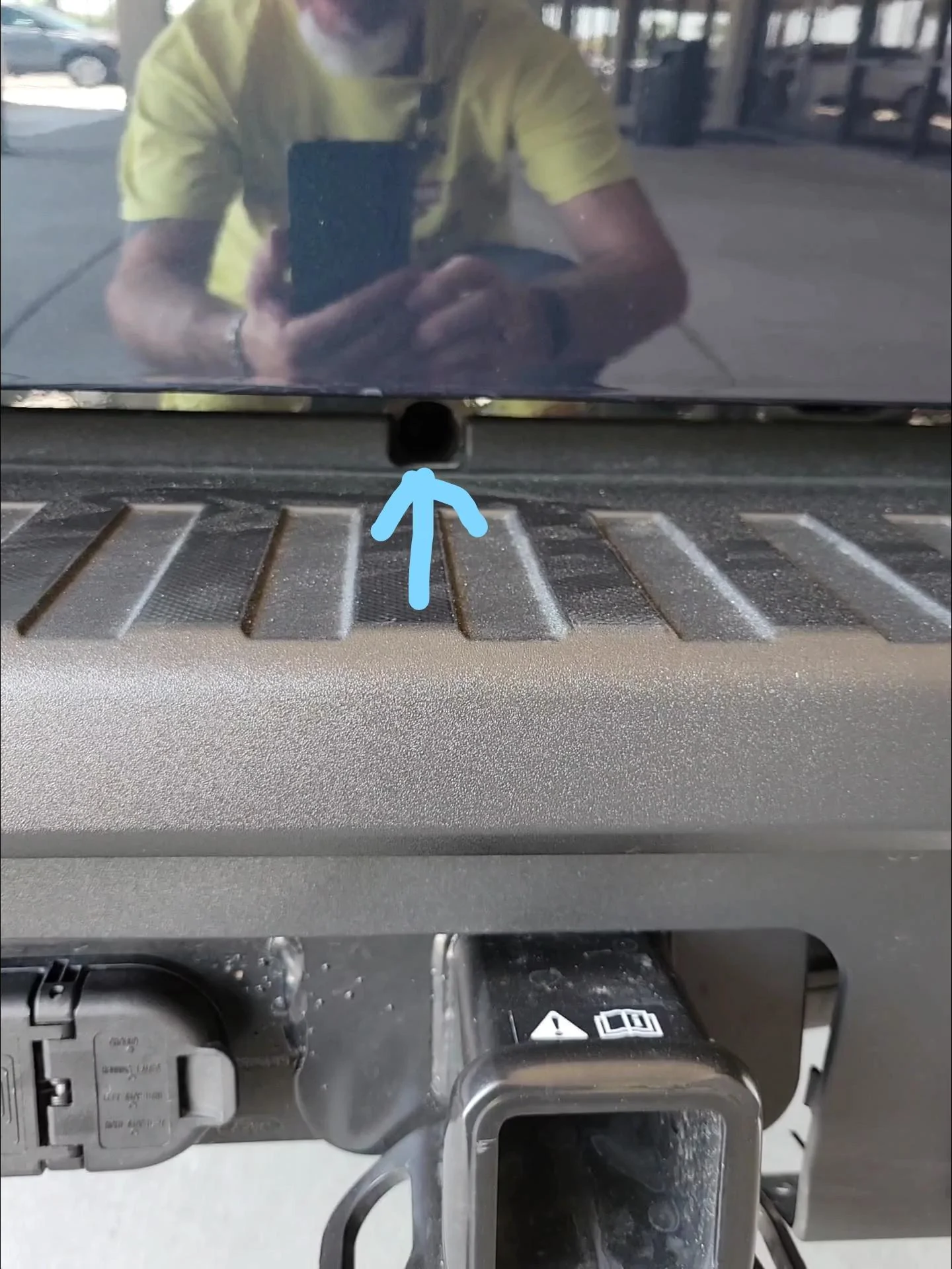 Ford Maverick After market LED tailgate light bars interfere with spare tire crank. InkedAlto Blue 8-25 spare tire hole_LI