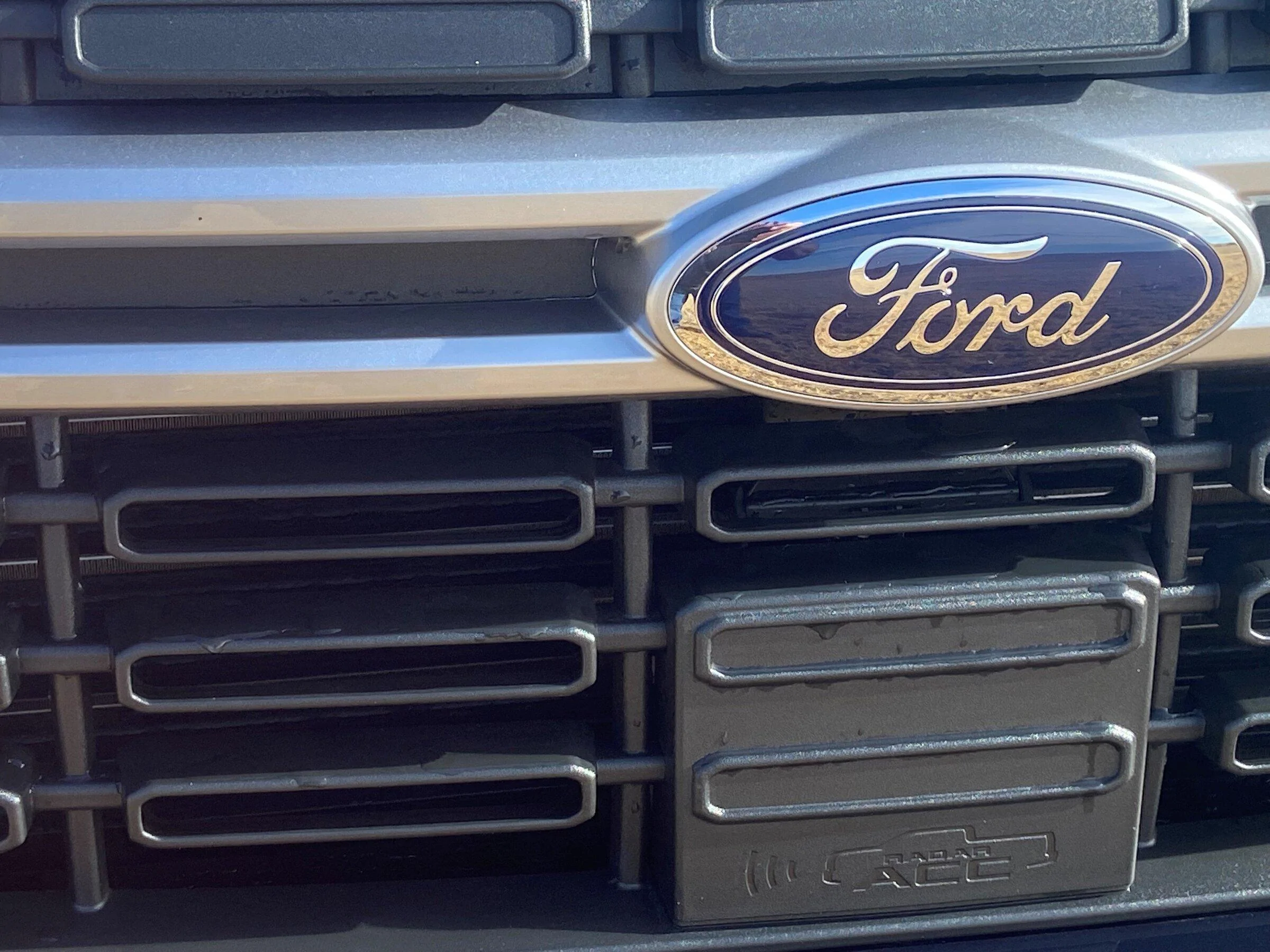 Ford Maverick Below the Ford emblem, what is that? mav 22