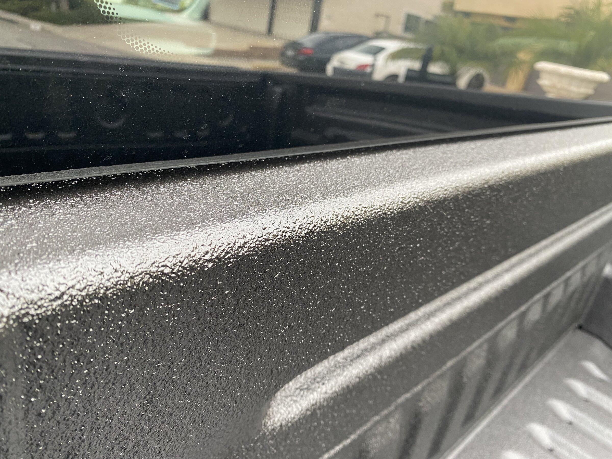 Ford Maverick Rattling after spray in bedliner under the rear windshield IMG_8037
