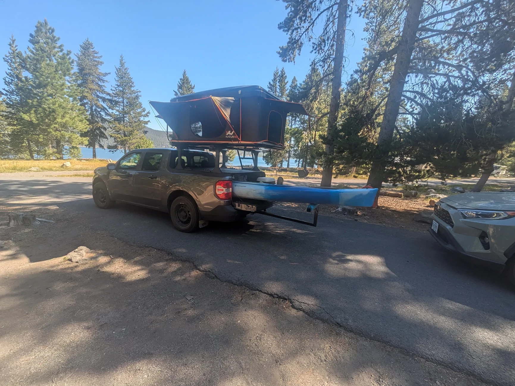 Ford Maverick Camping with rooftop tent and 12 ft kayaks 1000003263