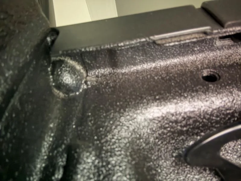 Ford Maverick What is this? - Access between bed and cab? Front Bed Corner Closeup sm