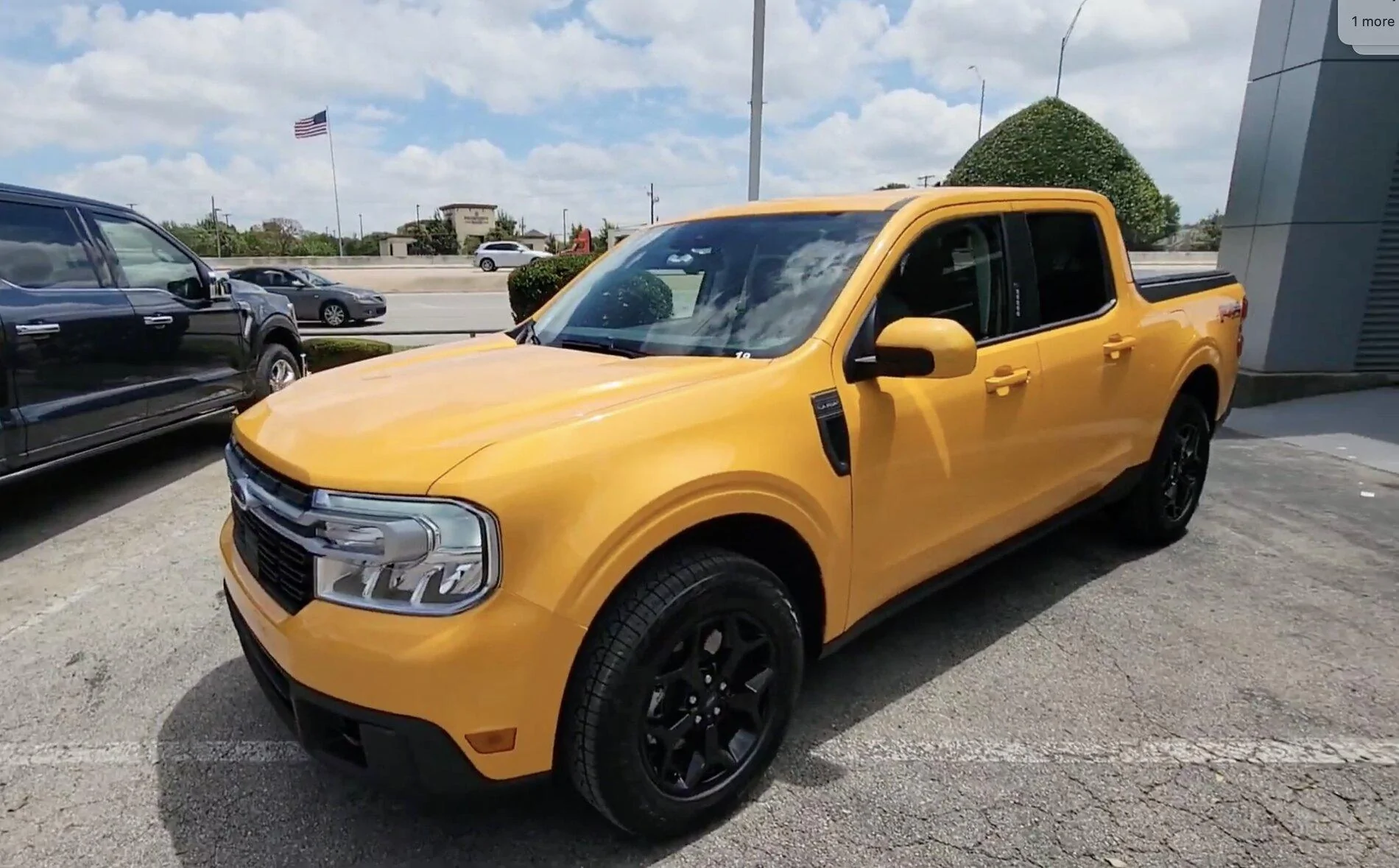 Ford Maverick CYBER ORANGE Maverick Photos Thread Cyber Orange 2022 Maverick Lariat FX4 black wheels 1
