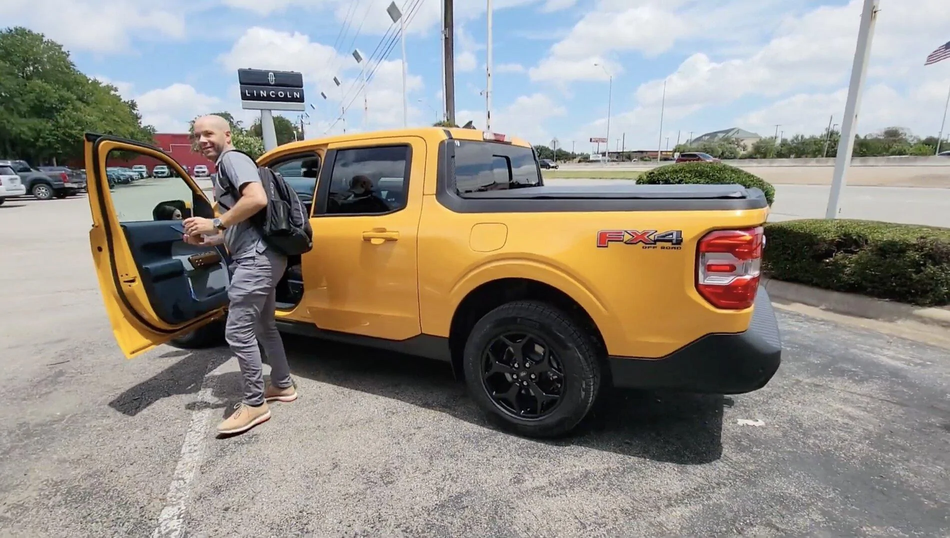 Ford Maverick CYBER ORANGE Maverick Photos Thread Cyber Orange 2022 Maverick Lariat FX4 black wheels 2