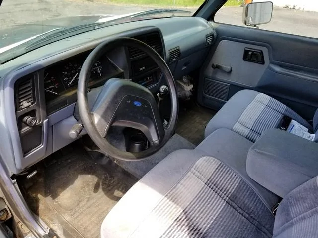 Ford Maverick Anyone else think interior blue is reminiscent of the 90s ford truck interiors? 1992_ford_ranger_xlt_standard_cab_lb-pic-6027594085098863107-640x480