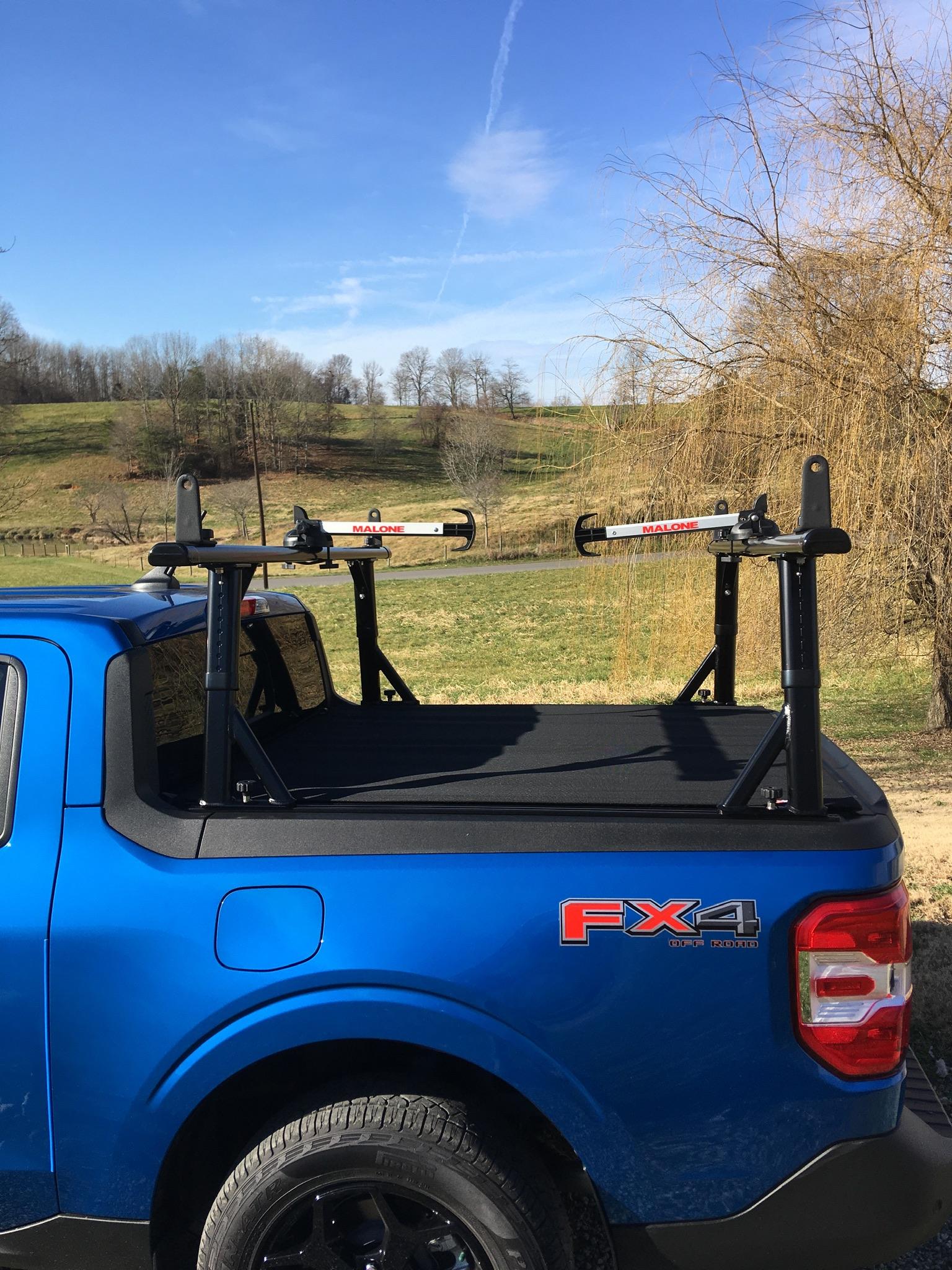 Ford Maverick Yakima adjustable rack with a cover 5AE9DDD9-141B-444F-94CB-1A57F85EFC9F
