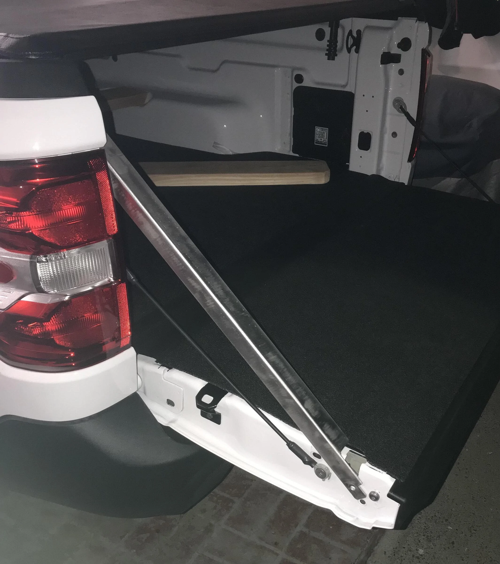 Ford Maverick My real truck can haul my motorcycles w/ help of custom metal tailgate support and level struts brace-jpg