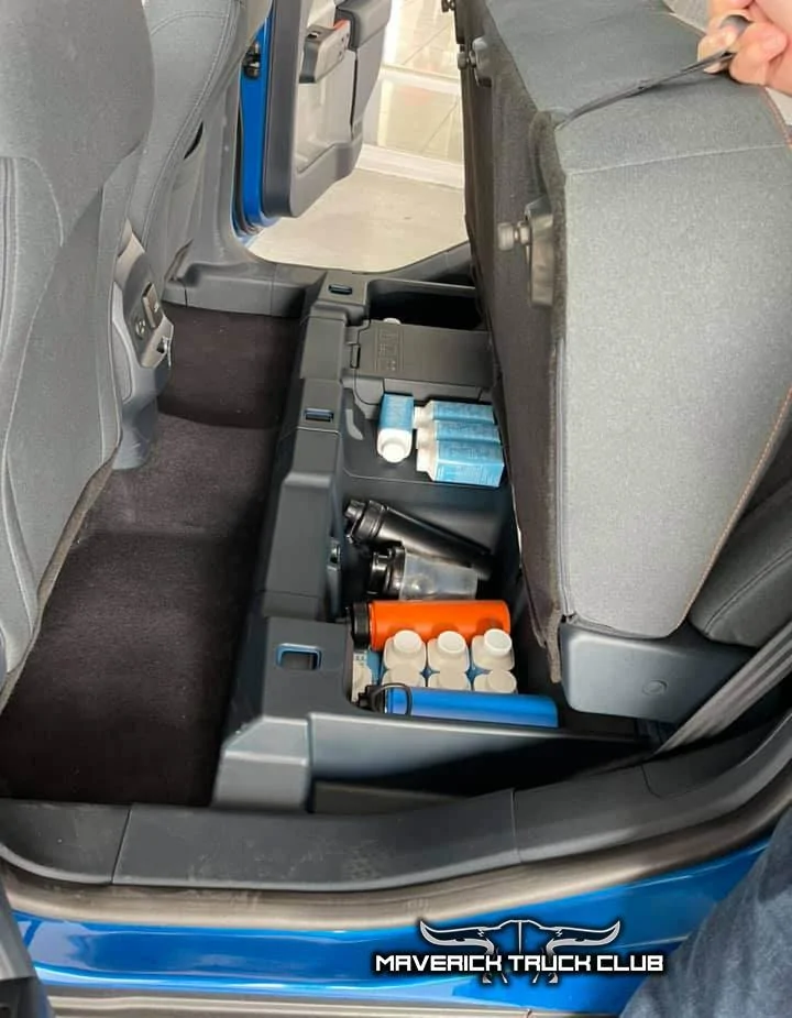 Ford Maverick Velocity Blue Maverick XLT + Hybrid 2.5L Engine Compartment Underhood Pics Underseat storage compartment 2022 Maverick XLT Hybrid 2.5L 