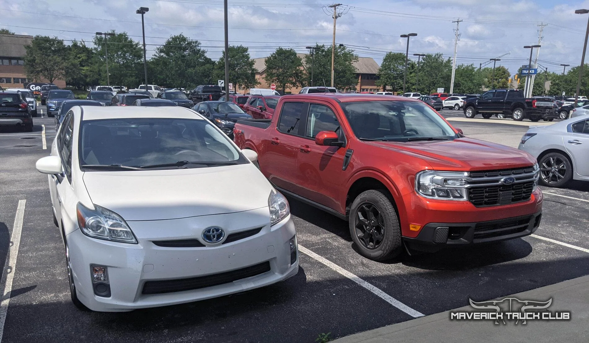 Ford Maverick HOT PEPPER RED Maverick Photos Thread Hot Pepper Red 2022 Maverick Lariat FX4 vs Prius 3