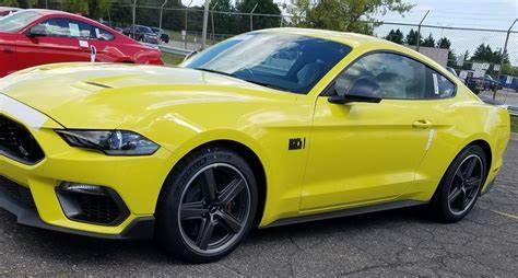 Ford Maverick 4 Pics & 3 interesting items from Maverick visit -- Active grille shutters. 33mpg from AWD 2.0L mustang yellow