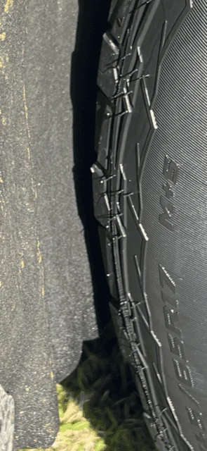 Ford Maverick Toyo Open Country AT3 245/70r17 close up of wheel lock position