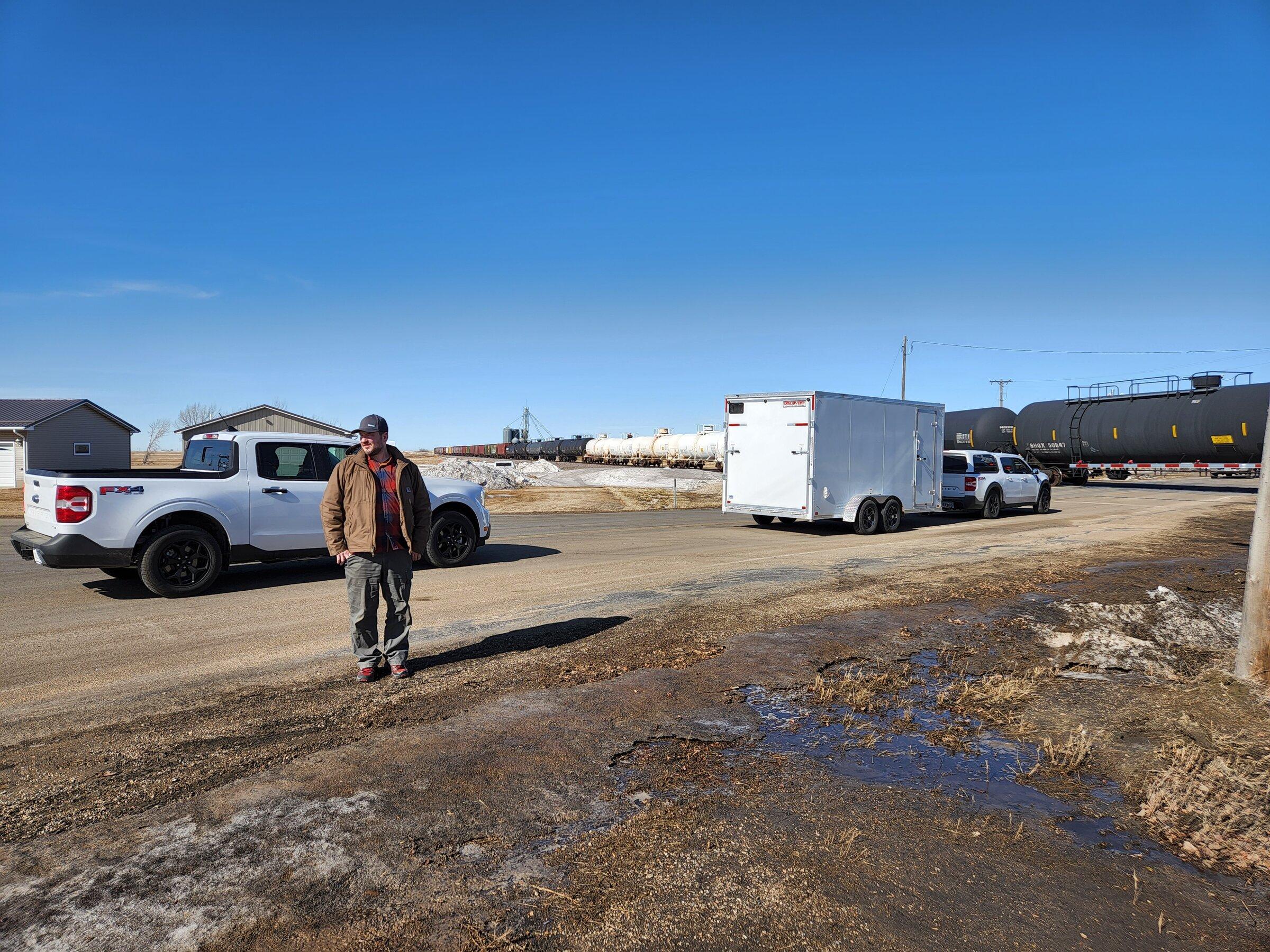 Ford Maverick Alaskan Bound - Delivery Road Trip Home in Two New Mavericks train crossing at Bowbells North Dakota