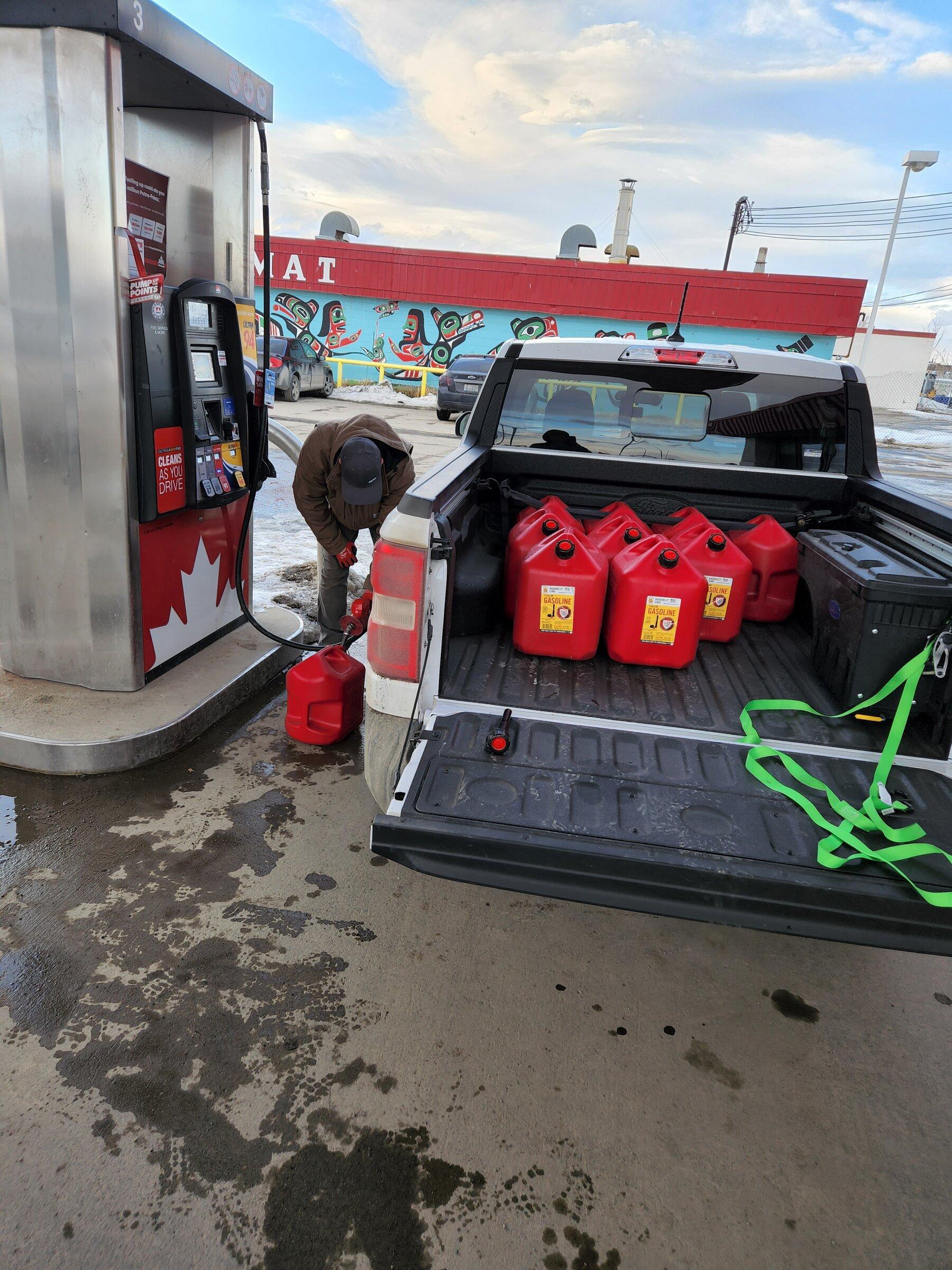 filling gas cans.jpg