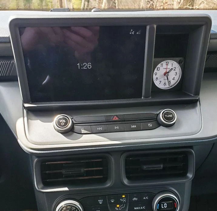 Ford Maverick Dash cubby hole -- what's in yours? 📸 clock